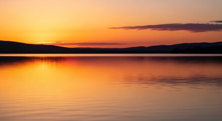 Obraz premium Serene Lake Reflections at Sunset A Captivating View of Nature's Beauty