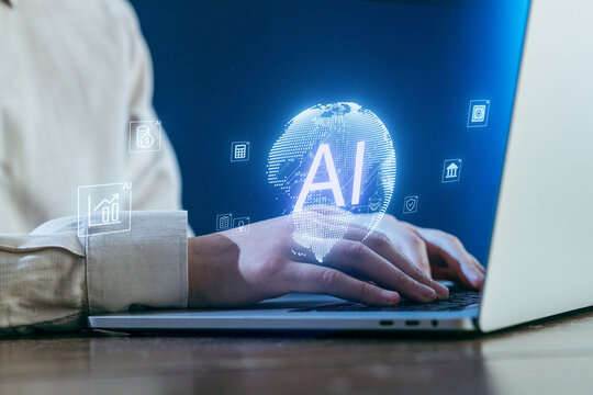 Exploring AI technology on a laptop with glowing graphics depicting global data and analytics - Powered by Adobe