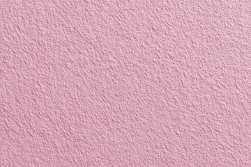 Subtle textured pink fabric background with a soft and delicate appearance