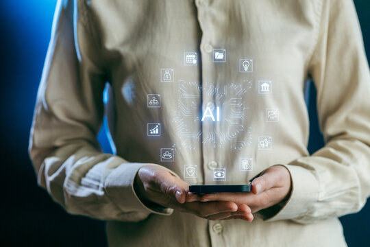 Person interacts with AI technology using a smartphone, showcasing digital icons related to various applications in a modern setting