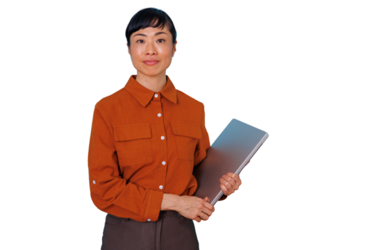 Asian businesswoman holding laptop and smiling. Confident professional woman standing with a modern device, transparent background