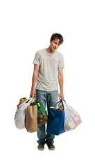 A person looking exhausted holding five different grocery bags