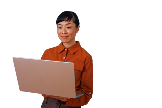 Asian woman working on laptop, engaging with business technology and digital communication, smiling confidently on transparent background