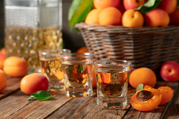 Apricot liqueur or grappa and fresh apricots.