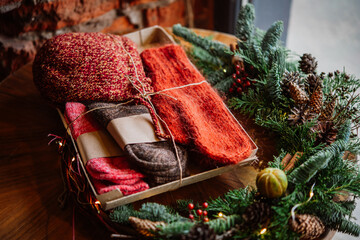 Christmas wreath and wintertime gifts prepared for celebration.