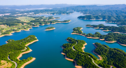 Serene aerial view of a winding river with lush green islands