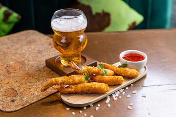 Crispy Fried Shrimp with Sweet Chili Dip and Refreshing Beer