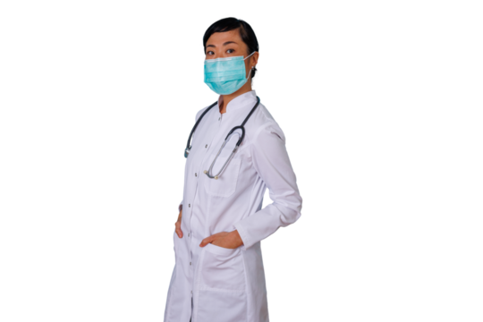Asian doctor woman in lab coat wearing face mask and stethoscope providing medical healthcare service