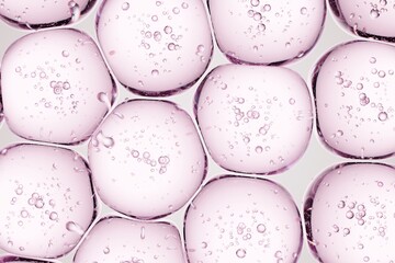 Transparent pink gel beads with internal bubble structures, crafted for skincare marketing, modern branding, and contemporary digital compositions