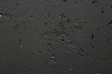 Concrete wall texture with rough surface and natural imperfections. Grey industrial background for design, construction concepts and architectural materials.