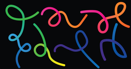 Vibrant neon glow sticks twisted into abstract shapes and letters against a black background