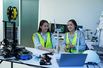 Technicians work with a 3D printer to print a clear white plastic model using cutting-edge technology, focusing on specific points, in a lab.