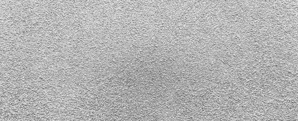 Surface texture showcasing intricate patterns and subtle variations in shades of gray, highlighting...