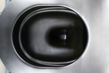 Modern black toilet design in a stylish bathroom showcasing minimalist aesthetics and practical functionality