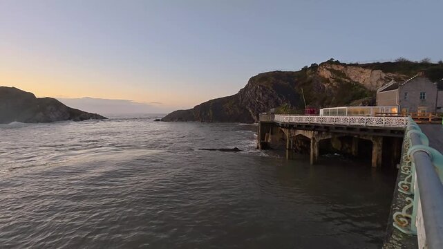 4K video as dawn breaks over the Mumbles Pier in Glamorgan, Wales