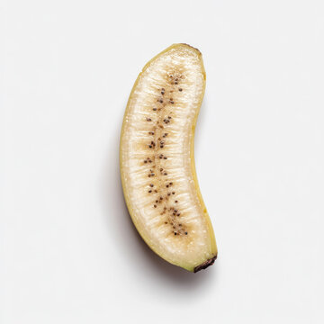 A curved segment of a banana, sliced lengthwise to expose its delicate interior and tiny seeds, isolated on white background