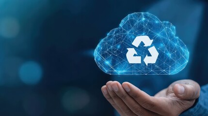 Digital cloud technology concept showcasing sustainability and eco friendly practices represented by a holographic recycling symbol in the hands of a user emphasizing innovation and