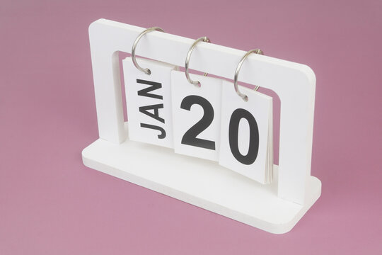 January, 20 on calendar on purple background.