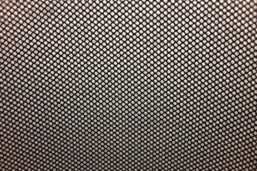 close-up view of a tightly woven mesh fabric featuring a repeating, uniform diamond pattern and texture with small holes, polyester textile suitable for chair upholstery