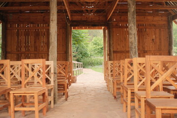 Rustic Wooden Seating Inside Open-Air Structure