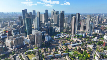 Fototapeta premium Aerial drone photo of iconic skyscraper complex and business area of Canary Wharf, Docklands, London, United Kingdom