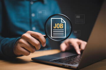 Person searching for job opportunities online with a magnifying glass over a job icon.