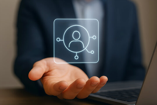 Businessman presenting glowing user icon with connections in hand - Powered by Adobe