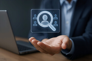 Businessman showing search icon with multiple user profiles in hand