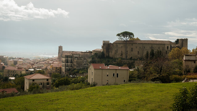 Scenic panoramic view of Eboli town surrounded by hills under clear blue sky