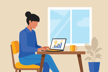 Woman working on laptop with growth chart at desk