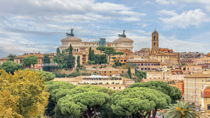 Rome, Italy. Scenic view of historic architecture surrounded by lush greenery and vibrant trees, showcasing a beautiful urban landscape with a blend of nature and city life