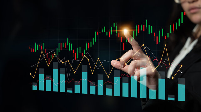 A businesswoman interacts with a digital financial graph using a touchscreen, showcasing stock market analysis and highlighting economic trends for informed decisions. Scalp - Powered by Adobe