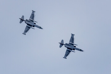 Two fighter jets are flying in the sky during border protection operation.	