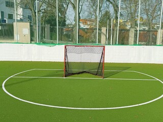 Mini-football field with artificial green turf © Diana