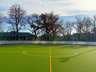 Mini-football field with artificial green turf © Diana