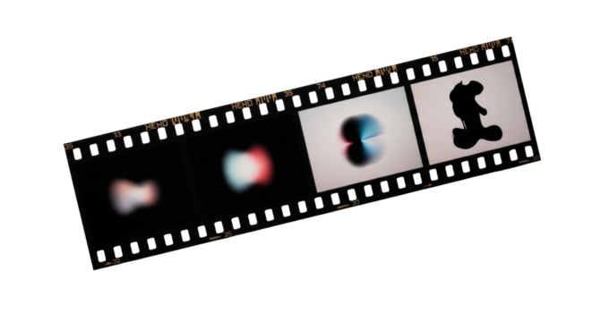 A pristine black 35mm film strip featuring four distinct abstract images, horizontal with sprocket holes, on a transparent background with soft studio lighting. Concept of creative evolution and time