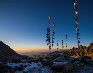 Obraz premium Majestic Mountain Landscape with Colorful Flags at Sunrise
