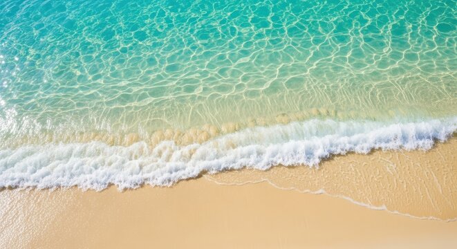 Aerial view of a pristine tropical beach with crystal clear turquoise water gently lapping onto the golden sand, showcasing the serene beauty of a secluded paradise - Powered by Adobe