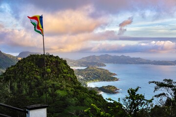 Fototapeta premium flag on the top of mountain Seychelles top view