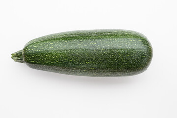  Fresh courgette on a white background.