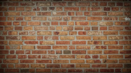 Fototapeta premium A traditional brick wall with a pattern of red and brown bricks.