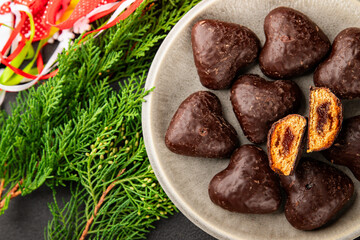 Gingerbread chocolate heart shaped honey cakes Christmas sweet dessert new year natural product tasty snack fresh delicious gourmet food background on the table rustic top view copy space
