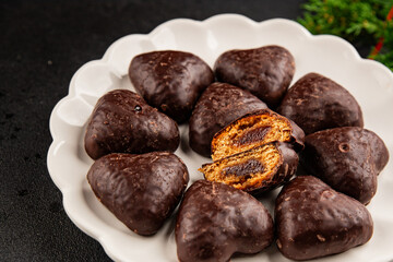 Gingerbread chocolate heart shaped honey cakes Christmas sweet dessert new year natural product tasty snack fresh delicious gourmet food background on the table rustic top view copy space