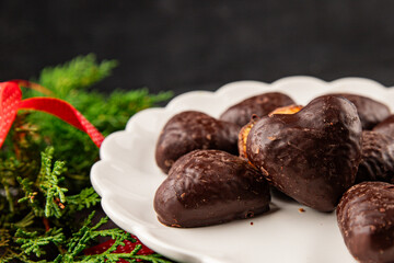 Gingerbread chocolate heart shaped honey cakes Christmas sweet dessert new year natural product tasty snack fresh delicious gourmet food background on the table rustic top view copy space