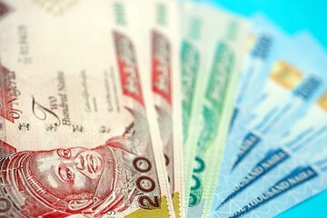 Nigerian naira money bills in big amount close up. Finance and banking concept