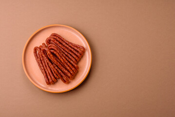 Smoked cabanossi, thin salami sausage, meat sticks, or snacks. Cabanossi sausage