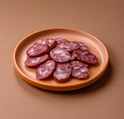 Smoked salami, thin beef or pork sausage, meat snacks. Salami sausage
