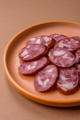 Smoked salami, thin beef or pork sausage, meat snacks. Salami sausage