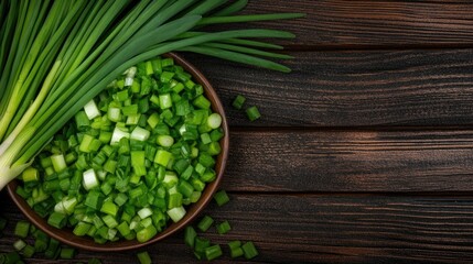 Close-up of diced green onions in a bowl, fresh potatoes and chives arranged on a wooden table, perfect for cooking or garnishing