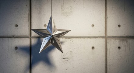 Origami Star Decoration Hanging Against Textured Concrete Wall.